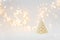 Christmas background with fir tree candle and defocused lights. Christmas or New Year celebration concept. Copy space