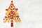 Christmas background in the form of an edible Christmas tree with winter traditional spices to improve immunity during the cold