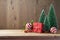 Christmas background with gift boxes and ornament on wooden tabl