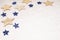 Christmas background, with gold and blue glitter stars and snow