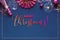 Christmas background with golden and pink decorations, lights garland, text Merry Christmas