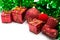 Christmas background with green ornament and red gift box