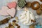 Christmas background - hot chocolate with marshmallows, cinnamon stick in a white mug, top view. Hot cocoa drink for Christmas and