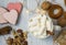 Christmas background - hot chocolate with marshmallows, cinnamon stick in a white mug, top view. Hot cocoa drink for Christmas and