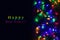 Christmas background with lights and free text space. Christmas lights border. Glowing colorful Christmas lights on black