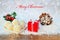 Christmas background with lights gift chocolate and pine cone