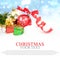 Christmas background with a red ornament gift box berries and in