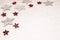 Christmas background, with red and silver glitter stars and snow