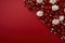 Christmas background with red and white baubles and snowflakes