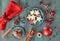 Christmas background in red and white on rustic turquoise wood