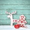 Christmas background, small scandinavian styled decorations in front od blue wooden wall, illustration