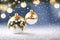 Christmas background with spruce branches decorated with Christmas baubles, snowflakes, and lights