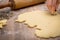 Christmas bakery with fresh cookie dough and biscuit cutter, rolling pin