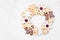 Christmas baking wreath arrangement with an assortment of snowflake cookies