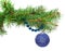 Christmas ball with blue beads on a fir-tree branc