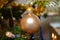 Christmas ball macro hanging on the Christmas tree