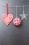 Christmas ball, silvered star and a red heart
