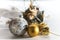 Christmas balls. gold an silver on a blurry white background