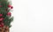 Christmas banner with green fir tree branch with red berries on white banner with copy space or place for text