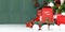 Christmas banner with red santa mail box in front of tree with green background