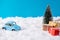 Christmas banner of tiny blue santa claus automobile driving snowy road on big discounts shopping greeting giftboxes