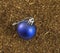 christmas bauble on a dry tobacco background