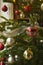 Christmas Baubles on a illuminated Christmas tree