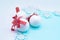 Christmas baubles, white balls with sparkles and snowflakes on a white and blue background. New Year and Christmas