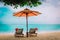 Christmas on beach -chair lounges with Santa hats at sea