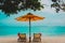 Christmas on beach -chair lounges with Santa hats at sea