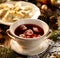 Christmas beetroot soup, borsch with small dumplings with mushroom stuffing, traditional Christmas soup in Poland.