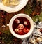 Christmas beetroot soup, borsch with small dumplings with mushroom stuffing, traditional Christmas soup in Poland. Top view