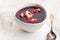 Christmas beetroot soup, borscht with small dumplings with mushroom filling