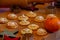 Christmas Biscuit on a wooden plate with decoration and a rolling pin. Christmas Sweets for children