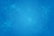 Christmas blue background with glowing snowflakes and bokeh. vertor illustration