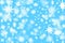 Christmas blue background with a lots of snow flakes and stars w