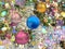 Christmas  blue gold lilac  ball on green tree and  colorful confetti illumination blurred light holiday background greetings card