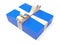 Christmas box. Blue gift box decorated with shiny silver ribbon