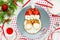 Christmas breakfast idea for kids santa pancakes with strawberries