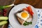 Christmas Breakfast Meal with Egg, Bread, and Vegetables