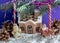 Christmas brown fairy House. Gifts, Christmas trees, sleds, skis, deer, gingerbread, Santa Claus fawn and snowman. Holidays