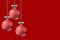 Christmas Bulbs Displayed on a Red Background