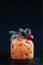 Christmas cake panettone and Christmas decorations over  black background. Xmas pastry