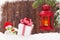 Christmas candle lantern, gift box and snowman