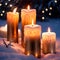 Christmas candles burning outdoors in the snow, traditional seasonal cultural festivities