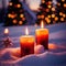 Christmas candles burning outdoors in the snow, traditional seasonal cultural festivities