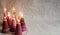 Christmas candles. Decoration on crumpled paper background