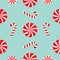 Christmas Candy Cane Round white and red sweet set. Seamless Pattern Decoration. Wrapping paper, textile template. Blue background