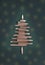 Christmas card with colorful pencils as christmas tree - green cardboard background