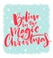 Christmas card design. Believe in the magic of Christmas. Inspirational xmas quote. Red brush calligraphy text on blue